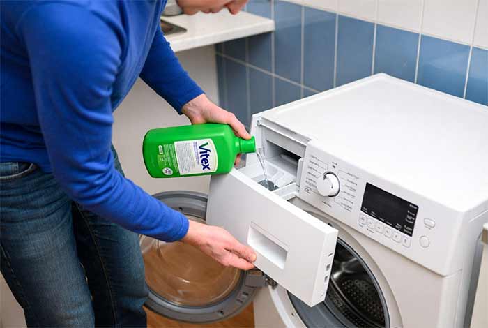 تمیزکاری جرمگیری ماشین لباسشویی با وایتکس