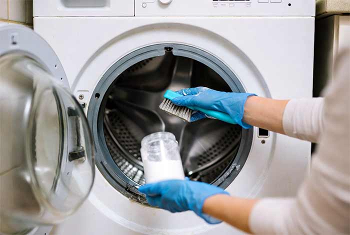 تمیزکاری جرمگیری ماشین لباسشویی با پودر یا قرص جرمگیر